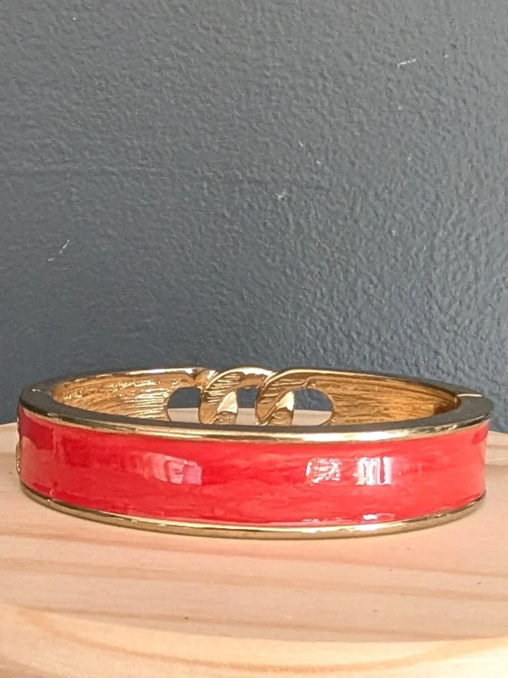 Gold and orange enamel bangle